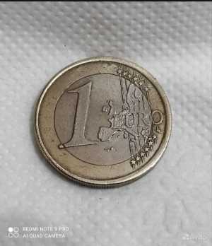 Монета