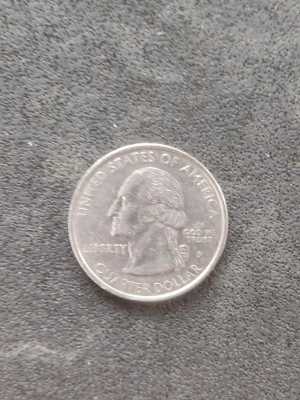 Продам монету США 1999г